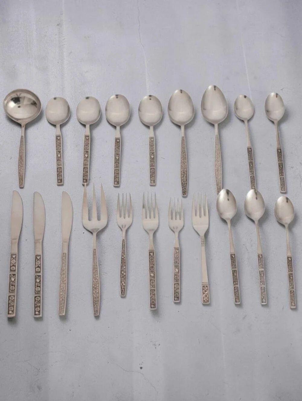 (Lot Of 20) Assorted Oneida Northland Spring Fever Stainless Steel Flatware Set.